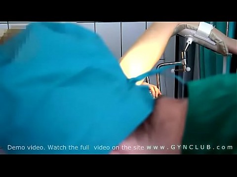 Woman in red examined by a gynecologist