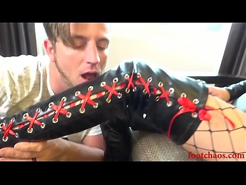 Davina Dark being worshiped in leather boots - FootChaos.com